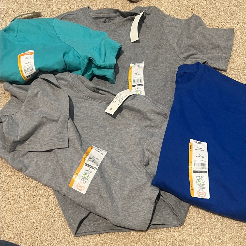 Wonder Nation kids tshirts. Two gray, one teal, one royal blue.